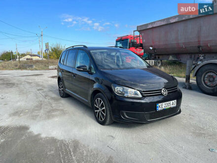 Черный Фольксваген Туран, объемом двигателя 1.6 л и пробегом 280 тыс. км за 9300 $, фото 1 на Automoto.ua