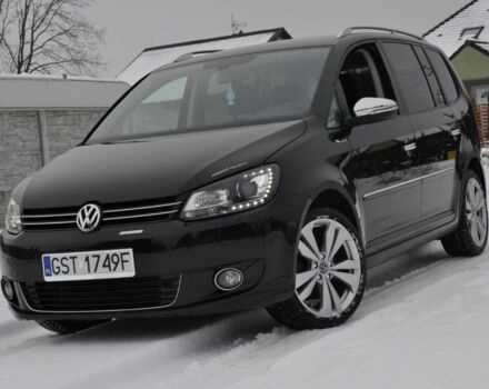 Чорний Фольксваген Туран, об'ємом двигуна 2 л та пробігом 230 тис. км за 6400 $, фото 1 на Automoto.ua