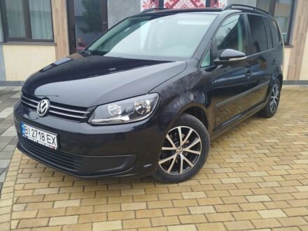 Черный Фольксваген Туран, объемом двигателя 1.6 л и пробегом 238 тыс. км за 9600 $, фото 1 на Automoto.ua