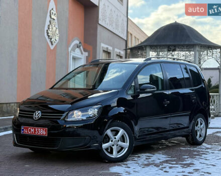 Черный Фольксваген Туран, объемом двигателя 2 л и пробегом 261 тыс. км за 12750 $, фото 1 на Automoto.ua