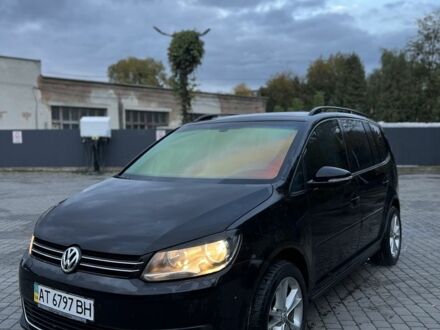 Фольксваген Туран 2011 в Ивано-Франковске на Automoto.ua Черный Фольксваген Туран, объемом двигателя 1.4 л и пробегом 233 тыс. км за 6950 $, фото 1 на Automoto.ua