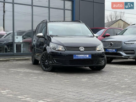 Черный Фольксваген Туран, объемом двигателя 1.4 л и пробегом 235 тыс. км за 8990 $, фото 1 на Automoto.ua
