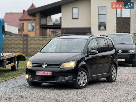 Черный Фольксваген Туран, объемом двигателя 2 л и пробегом 204 тыс. км за 11300 $, фото 1 на Automoto.ua
