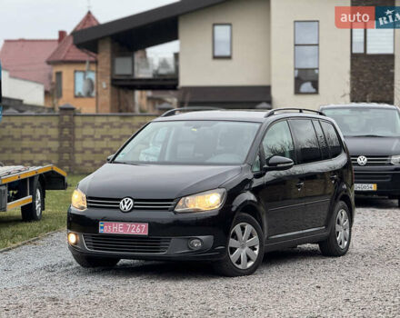 Черный Фольксваген Туран, объемом двигателя 2 л и пробегом 204 тыс. км за 11300 $, фото 1 на Automoto.ua