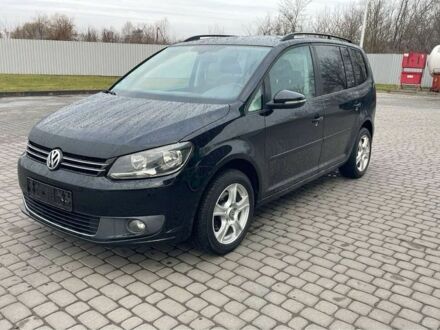 Черный Фольксваген Туран, объемом двигателя 1.6 л и пробегом 333 тыс. км за 8900 $, фото 1 на Automoto.ua