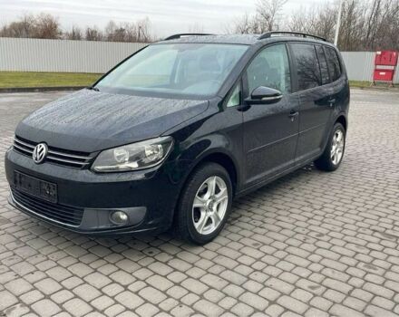 Черный Фольксваген Туран, объемом двигателя 1.6 л и пробегом 333 тыс. км за 8900 $, фото 1 на Automoto.ua