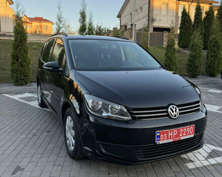 Черный Фольксваген Туран, объемом двигателя 1.6 л и пробегом 185 тыс. км за 11300 $, фото 1 на Automoto.ua