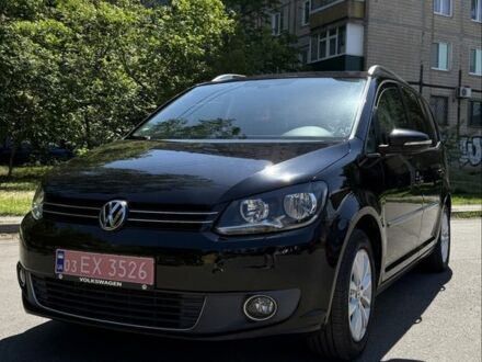 Фольксваген Туран 2011 у Кривому Розі на Automoto.ua Чорний Фольксваген Туран, об'ємом двигуна 1.4 л та пробігом 217 тис. км за 8900 $, фото 1 на Automoto.ua