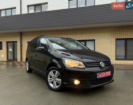 Чорний Фольксваген Туран, об'ємом двигуна 1.6 л та пробігом 218 тис. км за 10650 $, фото 1 на Automoto.ua