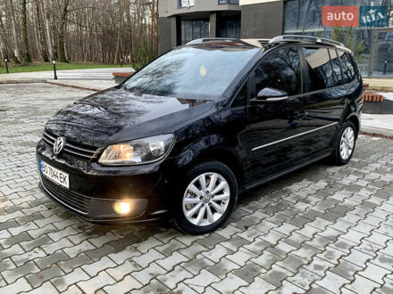 Черный Фольксваген Туран, объемом двигателя 2 л и пробегом 190 тыс. км за 11799 $, фото 1 на Automoto.ua