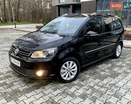 Чорний Фольксваген Туран, об'ємом двигуна 2 л та пробігом 190 тис. км за 11799 $, фото 1 на Automoto.ua