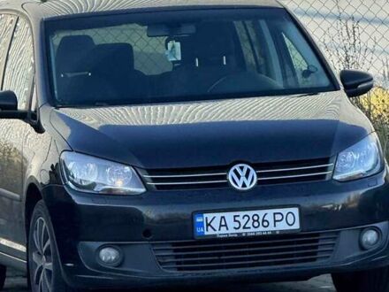 Черный Фольксваген Туран, объемом двигателя 1.39 л и пробегом 226 тыс. км за 9100 $, фото 1 на Automoto.ua