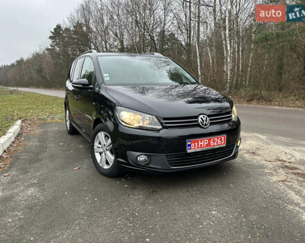 Чорний Фольксваген Туран, об'ємом двигуна 2 л та пробігом 262 тис. км за 12250 $, фото 1 на Automoto.ua