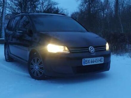 Черный Фольксваген Туран, объемом двигателя 1.6 л и пробегом 268 тыс. км за 9700 $, фото 1 на Automoto.ua