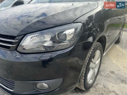 Черный Фольксваген Туран, объемом двигателя 1.97 л и пробегом 213 тыс. км за 11600 $, фото 1 на Automoto.ua