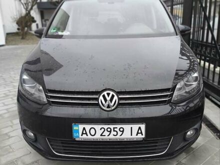 Черный Фольксваген Туран, объемом двигателя 1.97 л и пробегом 300 тыс. км за 13000 $, фото 1 на Automoto.ua