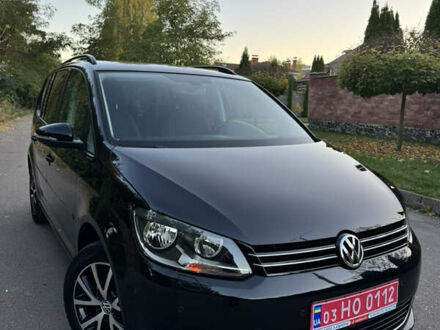 Черный Фольксваген Туран, объемом двигателя 1.6 л и пробегом 162 тыс. км за 11650 $, фото 1 на Automoto.ua