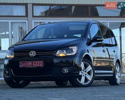 Черный Фольксваген Туран, объемом двигателя 2 л и пробегом 200 тыс. км за 11777 $, фото 1 на Automoto.ua