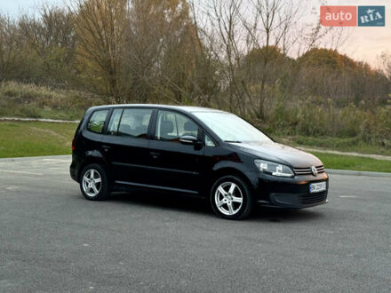 Черный Фольксваген Туран, объемом двигателя 1.6 л и пробегом 225 тыс. км за 8850 $, фото 1 на Automoto.ua