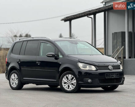 Чорний Фольксваген Туран, об'ємом двигуна 1.97 л та пробігом 243 тис. км за 12550 $, фото 1 на Automoto.ua