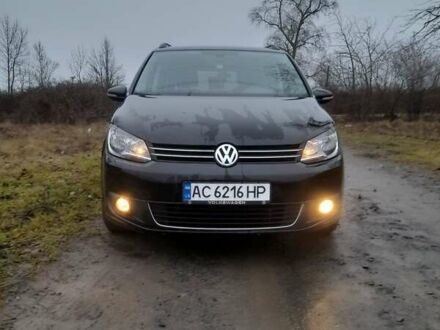 Чорний Фольксваген Туран, об'ємом двигуна 1.4 л та пробігом 235 тис. км за 9199 $, фото 1 на Automoto.ua