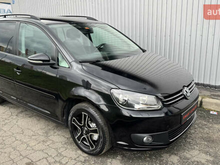 Черный Фольксваген Туран, объемом двигателя 1.6 л и пробегом 214 тыс. км за 11750 $, фото 1 на Automoto.ua