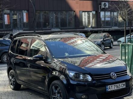 Черный Фольксваген Туран, объемом двигателя 1.4 л и пробегом 224 тыс. км за 9990 $, фото 1 на Automoto.ua