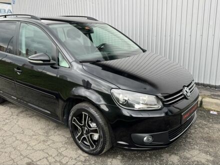 Черный Фольксваген Туран, объемом двигателя 1.6 л и пробегом 214 тыс. км за 11750 $, фото 1 на Automoto.ua