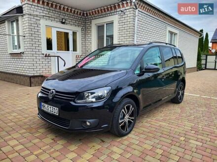 Черный Фольксваген Туран, объемом двигателя 1.6 л и пробегом 204 тыс. км за 11950 $, фото 1 на Automoto.ua