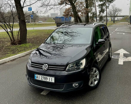 Черный Фольксваген Туран, объемом двигателя 2 л и пробегом 248 тыс. км за 9500 $, фото 1 на Automoto.ua
