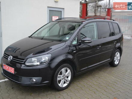 Черный Фольксваген Туран, объемом двигателя 2 л и пробегом 230 тыс. км за 14200 $, фото 1 на Automoto.ua