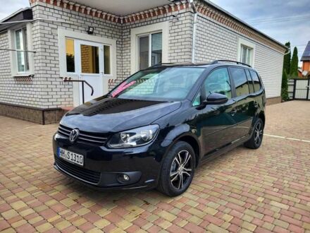 Фольксваген Туран 2013 у Полтаві на Automoto.ua Чорний Фольксваген Туран, об'ємом двигуна 1.6 л та пробігом 204 тис. км за 11950 $, фото 1 на Automoto.ua