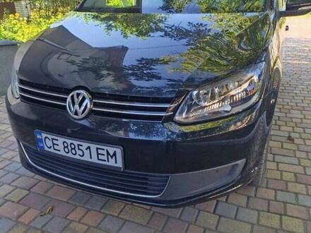 Черный Фольксваген Туран, объемом двигателя 1.6 л и пробегом 267 тыс. км за 11700 $, фото 1 на Automoto.ua