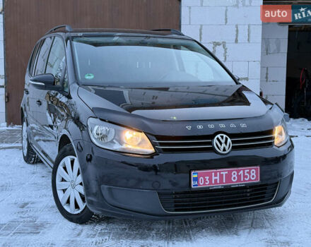 Черный Фольксваген Туран, объемом двигателя 1.6 л и пробегом 218 тыс. км за 10499 $, фото 1 на Automoto.ua
