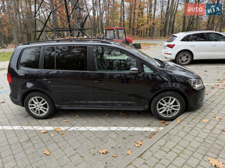 Черный Фольксваген Туран, объемом двигателя 1.6 л и пробегом 243 тыс. км за 8900 $, фото 1 на Automoto.ua