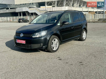 Черный Фольксваген Туран, объемом двигателя 1.6 л и пробегом 223 тыс. км за 11700 $, фото 1 на Automoto.ua