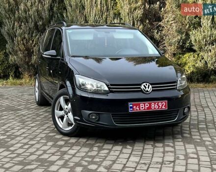 Черный Фольксваген Туран, объемом двигателя 2 л и пробегом 199 тыс. км за 13650 $, фото 1 на Automoto.ua