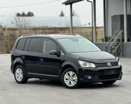 Черный Фольксваген Туран, объемом двигателя 2 л и пробегом 265 тыс. км за 12350 $, фото 1 на Automoto.ua