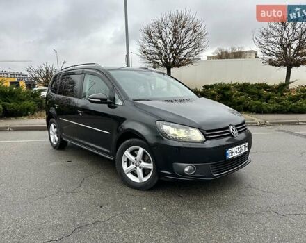 Чорний Фольксваген Туран, об'ємом двигуна 2 л та пробігом 240 тис. км за 11900 $, фото 1 на Automoto.ua