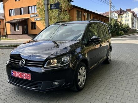 Черный Фольксваген Туран, объемом двигателя 1.4 л и пробегом 278 тыс. км за 10800 $, фото 1 на Automoto.ua
