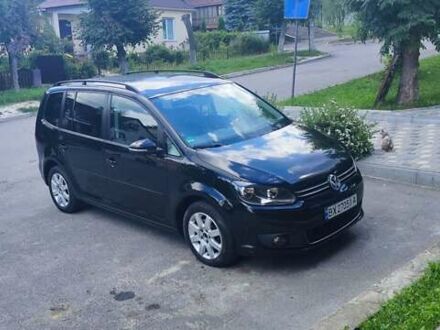 Фольксваген Туран 2014 в Хмельницком на Automoto.ua Черный Фольксваген Туран, объемом двигателя 1.6 л и пробегом 198 тыс. км за 12100 $, фото 1 на Automoto.ua