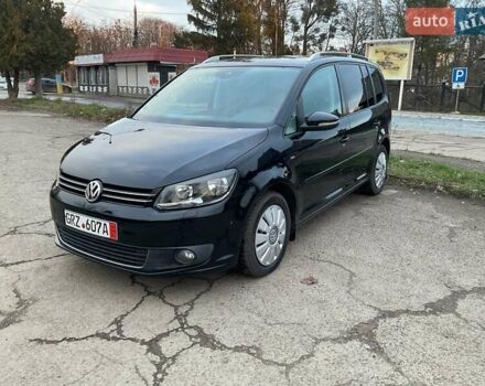 Черный Фольксваген Туран, объемом двигателя 1.6 л и пробегом 231 тыс. км за 11750 $, фото 1 на Automoto.ua