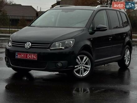 Черный Фольксваген Туран, объемом двигателя 2 л и пробегом 223 тыс. км за 13400 $, фото 1 на Automoto.ua