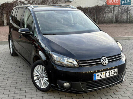 Черный Фольксваген Туран, объемом двигателя 2 л и пробегом 194 тыс. км за 14899 $, фото 1 на Automoto.ua