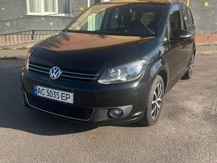 Черный Фольксваген Туран, объемом двигателя 1.6 л и пробегом 295 тыс. км за 12100 $, фото 1 на Automoto.ua