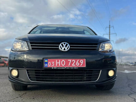 Черный Фольксваген Туран, объемом двигателя 1.97 л и пробегом 223 тыс. км за 13750 $, фото 1 на Automoto.ua