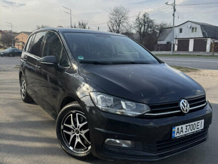 Черный Фольксваген Туран, объемом двигателя 1.6 л и пробегом 300 тыс. км за 13500 $, фото 1 на Automoto.ua