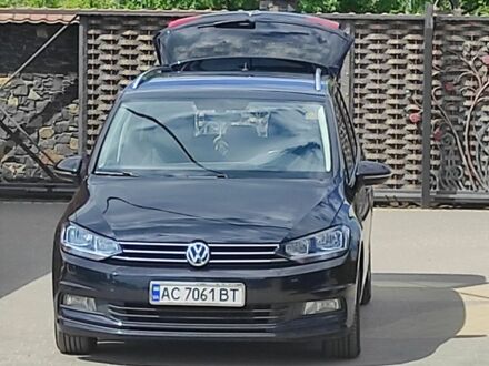 Черный Фольксваген Туран, объемом двигателя 2 л и пробегом 156 тыс. км за 19000 $, фото 1 на Automoto.ua