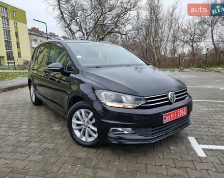 Черный Фольксваген Туран, объемом двигателя 1.6 л и пробегом 207 тыс. км за 15700 $, фото 1 на Automoto.ua