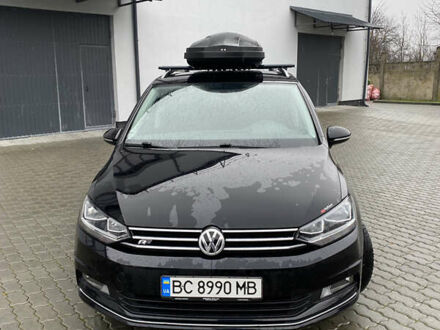 Черный Фольксваген Туран, объемом двигателя 1.97 л и пробегом 242 тыс. км за 14200 $, фото 1 на Automoto.ua